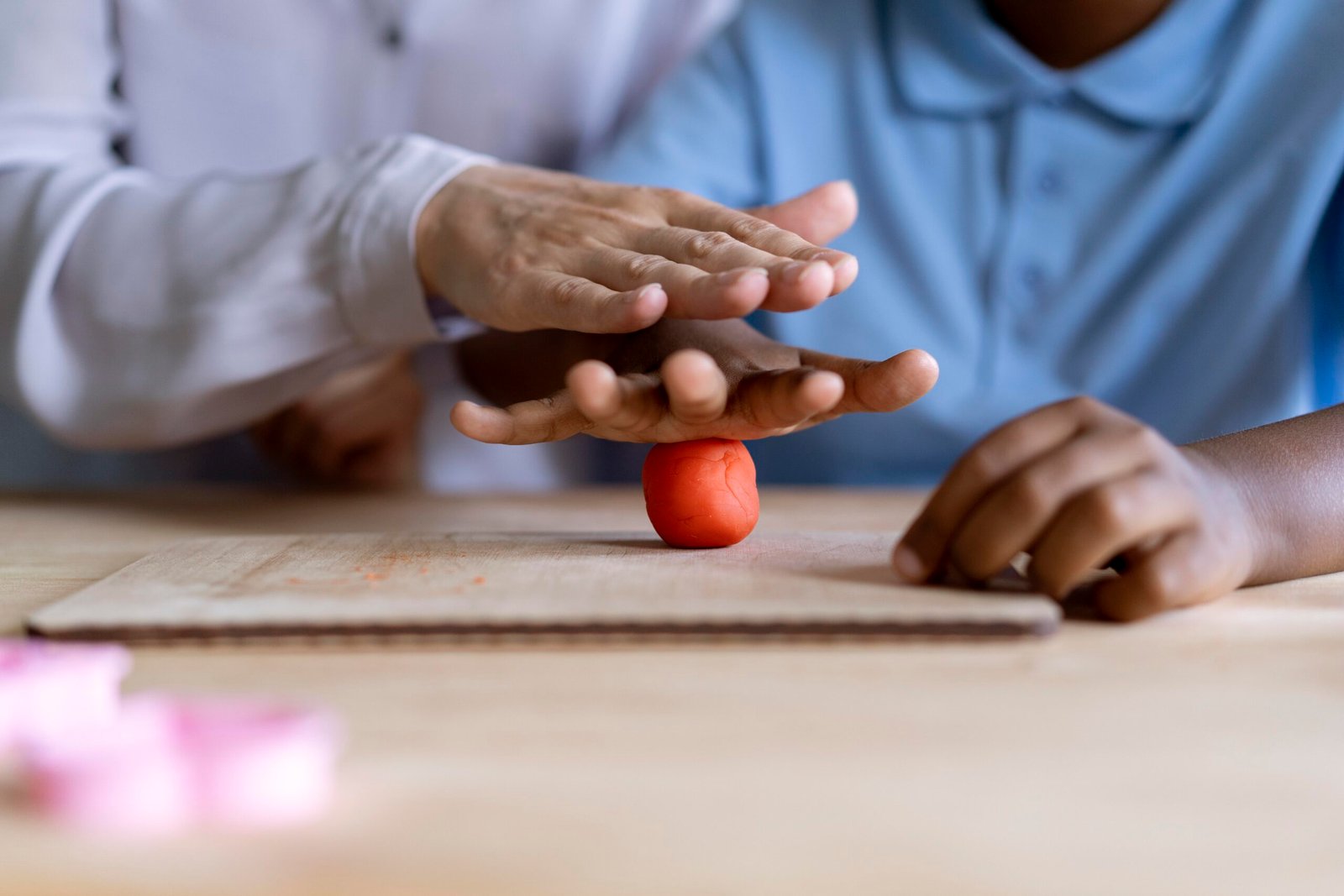 boy-doing-occupational-therapy-session-with-psychologist (1)